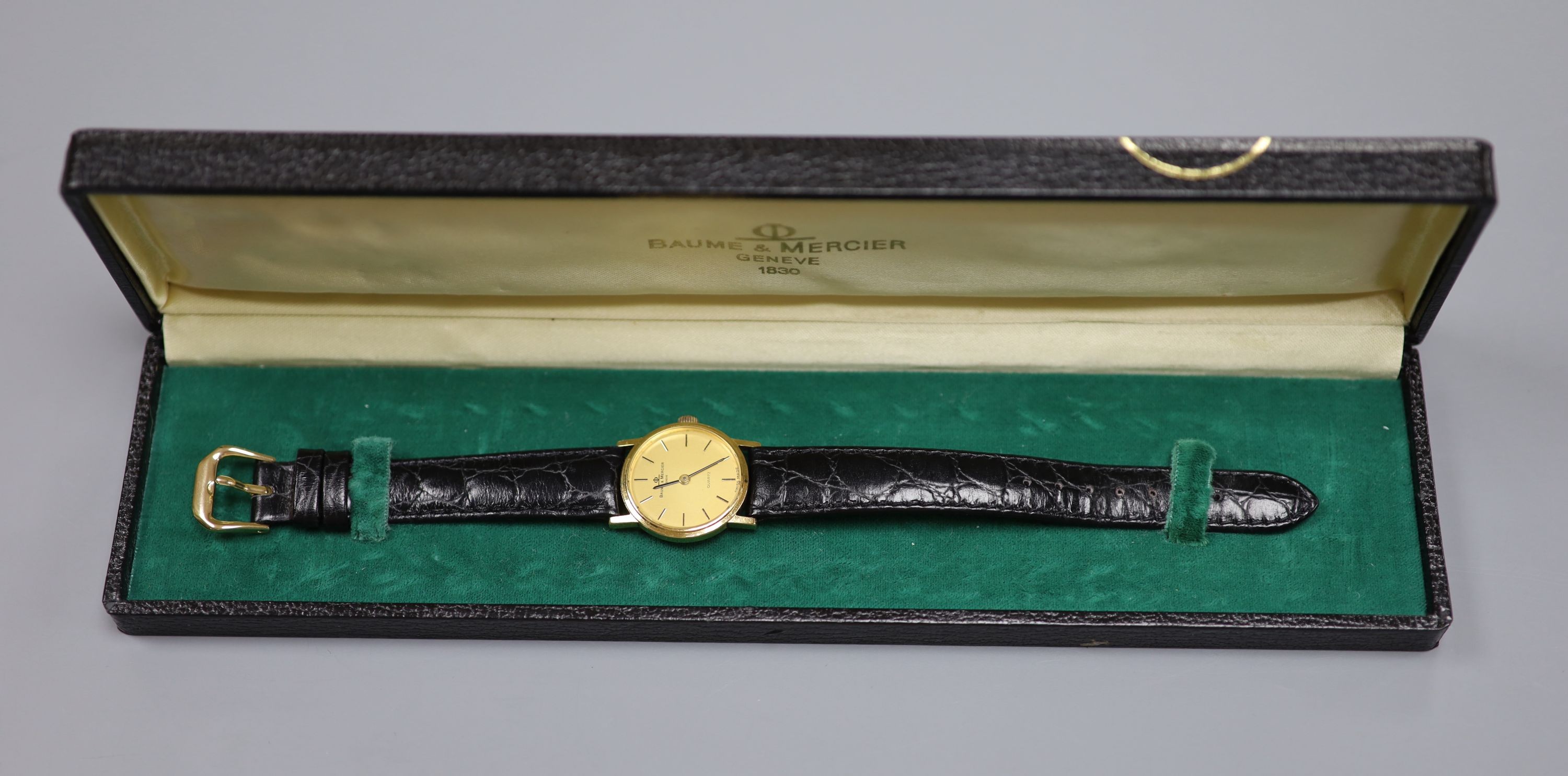 A lady's 18ct Baume & Mercier quartz wrist watch, on associated leather strap, in Baume & Mercier box